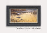 Grey & sliver framed picture of grey heron