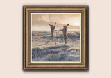 Bonze framed canvas print of boxing hares