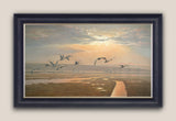 Framed canvas print of swans
