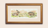 Picture of framed brown hares and kale stems
