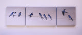 Block canvas print of swallows gathering 