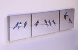 Block canvas print of swallows gathering ready to migrate